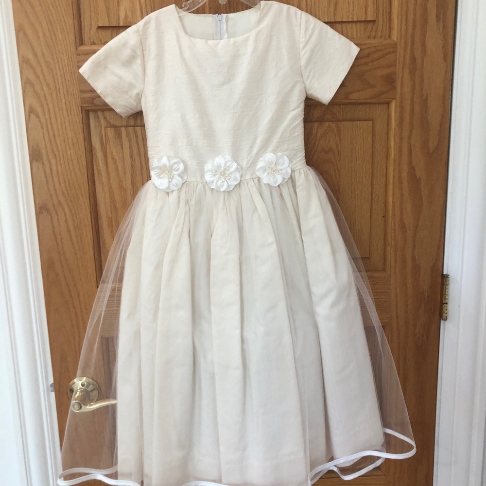Sylvia Whyte girls cream colored dress